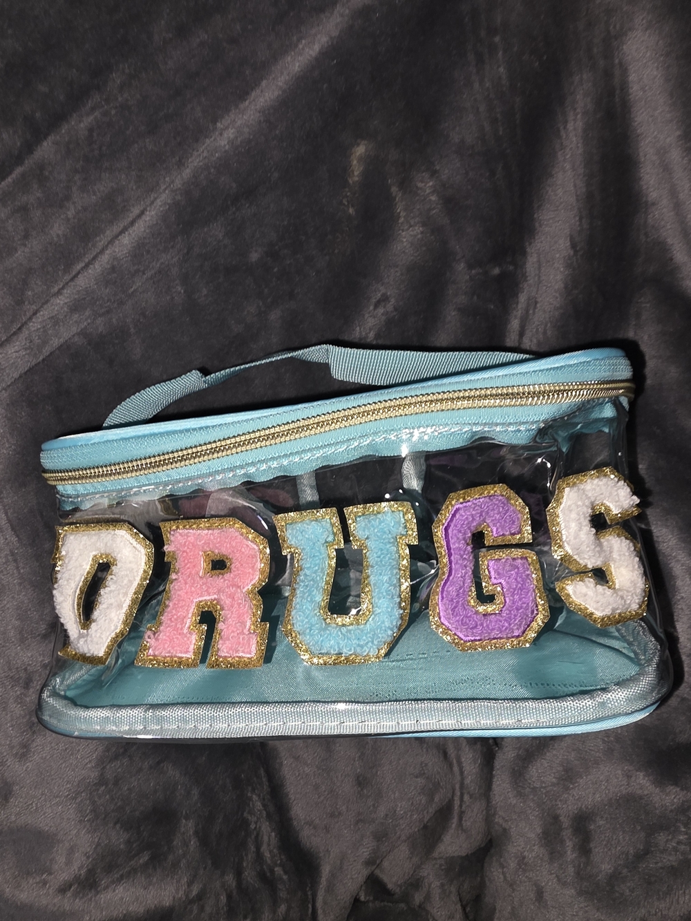 Clear/Blue Travel Bag For Medications With Colorful Letter Accents